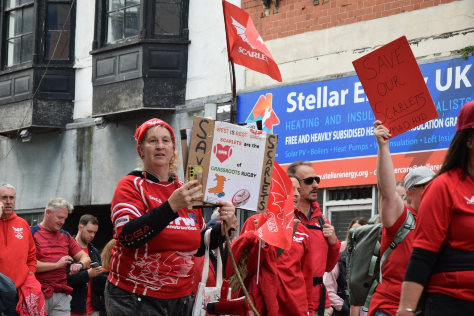 Placards raised for shoppers to see