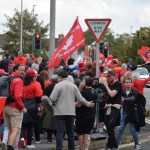 Crowds squeezed onto the narrow pavement