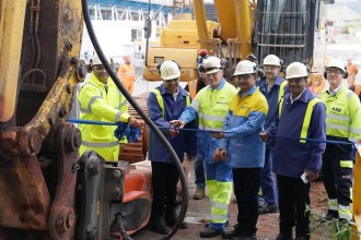 Pramod Agrawal with Tata Steel UK leaders at Port Talbot steelworks, cutting the ribbon to launch construction of the new pickle line.