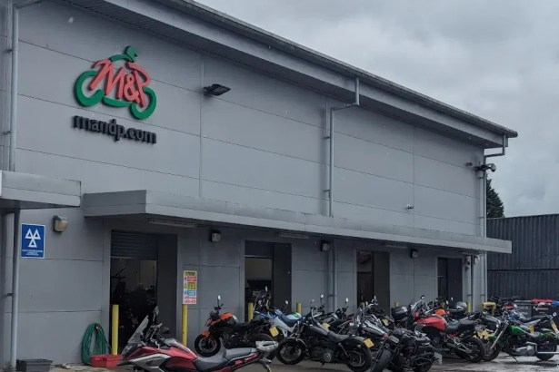 Motorcycles parked outside the M&P Direct building on Phoenix Way, Garngoch Industrial Estate, Swansea. The long‑established dealership closed in September 2025 after nearly five decades of trading.