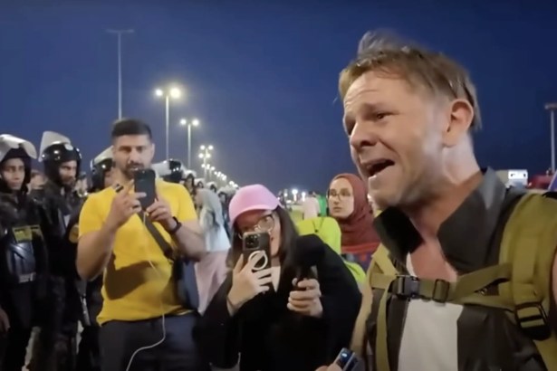 Leigh Evans crying and appealing to Egyptian police officers at the Rafah crossing into Gaza.