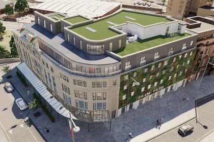 Visual rendering of the planned refurbishment of Swansea’s Grand Hotel, showing rooftop bar, new bedrooms and green design features.