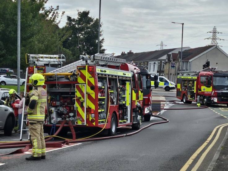 Firefighters from Neath, Port Talbot, Swansea Central, Morriston and Tumble battle a major blaze at an end‑terrace property on Furnace Terrace, Neath.