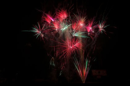 Bright fireworks lighting up the night sky over St Helen’s Ground in Swansea.