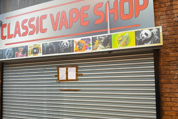 Front of Classic Vape shop in Port Talbot with shutters closed and council closure notice displayed.