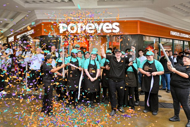 Crowds outside the new Popeyes restaurant on Oxford Street, Swansea, during its opening day on 3 October 2025.
