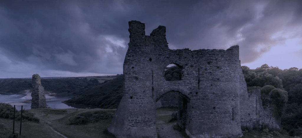 Oxwich Castle in Swansea’s Gower Peninsula is a haunting Tudor ruin with centuries of folklore and ghostly tales woven into its crumbling walls.