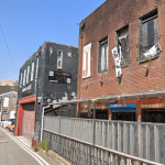 Street view of the derelict former gym and nightclub on Northampton Lane, Swansea.