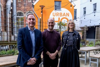 Cllr Rob Stewart with Urban HQ Directors Dr Ben Reynolds and Tara Tarapetian outside the newly opened Urban HQ in Swansea city centre.
