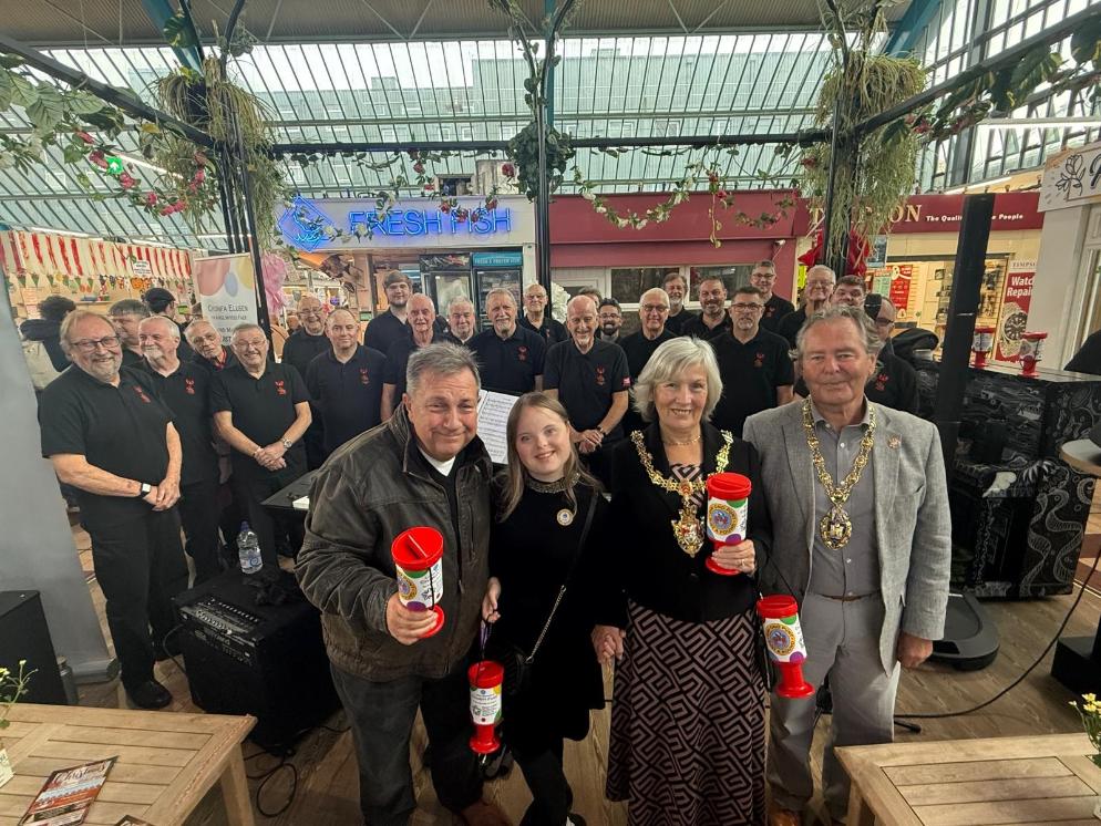 The Lord Mayor, Kev Johns and supporters launched the Just a Pound appeal at Swansea Market with music from the Phoenix Choir of Wales