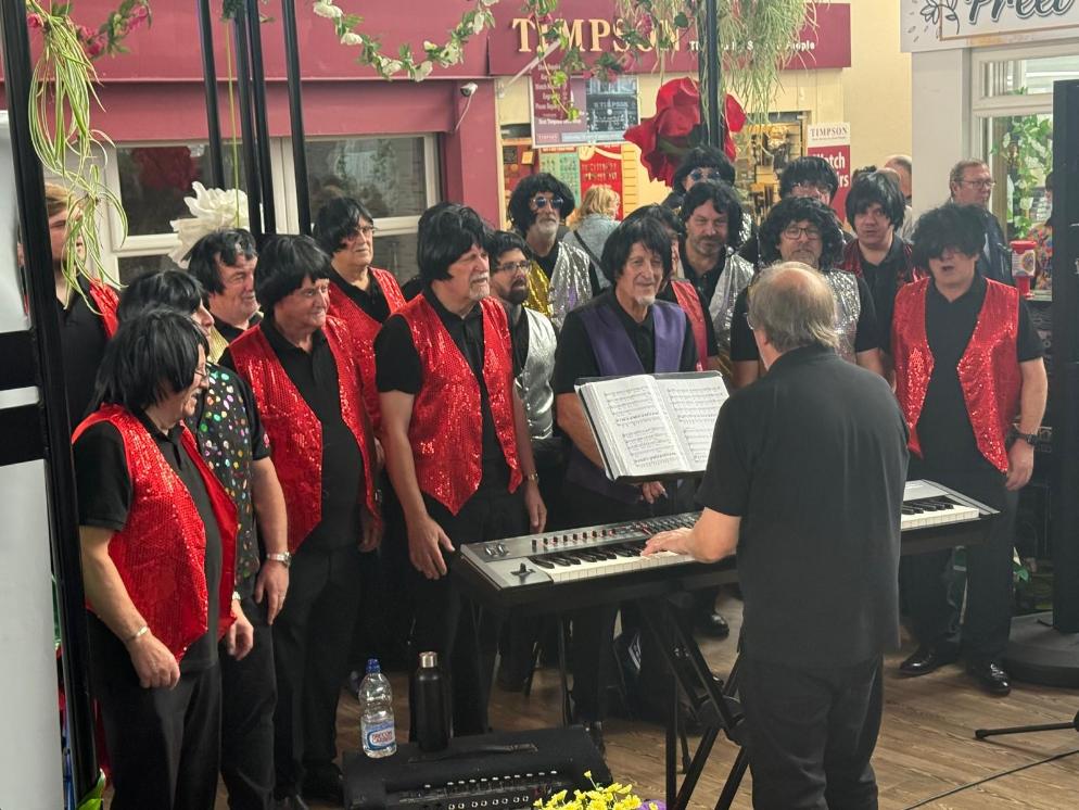 The Phoenix Choir of Wales entertained shoppers at Swansea Market during the launch of the Lord Mayor’s Just a Pound cancer appeal.