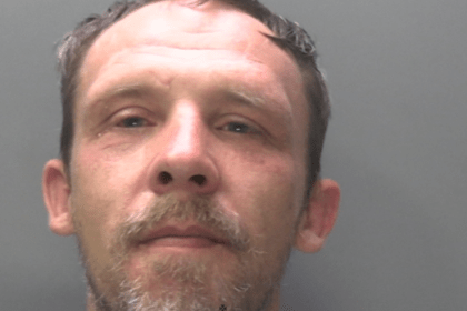 Custody photo of Swansea offender Johnathan Michael Jones, sentenced to 13 years for raping and sexually assaulting a vulnerable male victim.