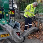 Leaf‑sucking and mulching machine on a trailer attached to a pick‑up truck, used by Swansea Council cleansing teams.