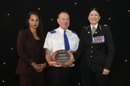 PCSO Stephen Evans pictured receiving his Community Award from South Wales Police.