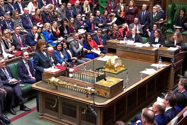 Rachel Reeves speaking at the despatch box in the House of Commons during the Autumn Budget 2025, with MPs seated on green benches.