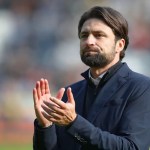 Russell Martin standing pitchside at the Swansea.com Stadium during his final weeks as Swansea City manager.