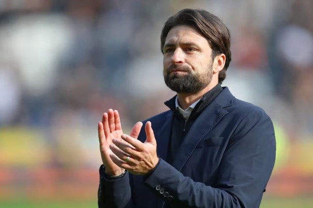 Russell Martin standing pitchside at the Swansea.com Stadium during his final weeks as Swansea City manager.
