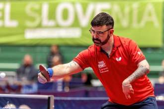 Paul Karabardak competing in table tennis, aiming for his third European doubles title in Sweden.