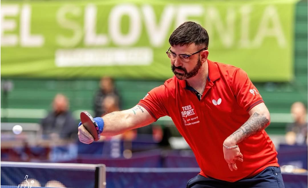 Paul Karabardak competing in table tennis, aiming for his third European doubles title in Sweden.