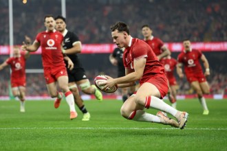 Tom Rogers scores a try for Wales against New Zealand at the Principality Stadium
