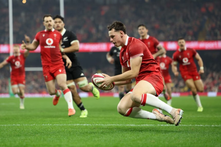 Tom Rogers scores a try for Wales against New Zealand at the Principality Stadium