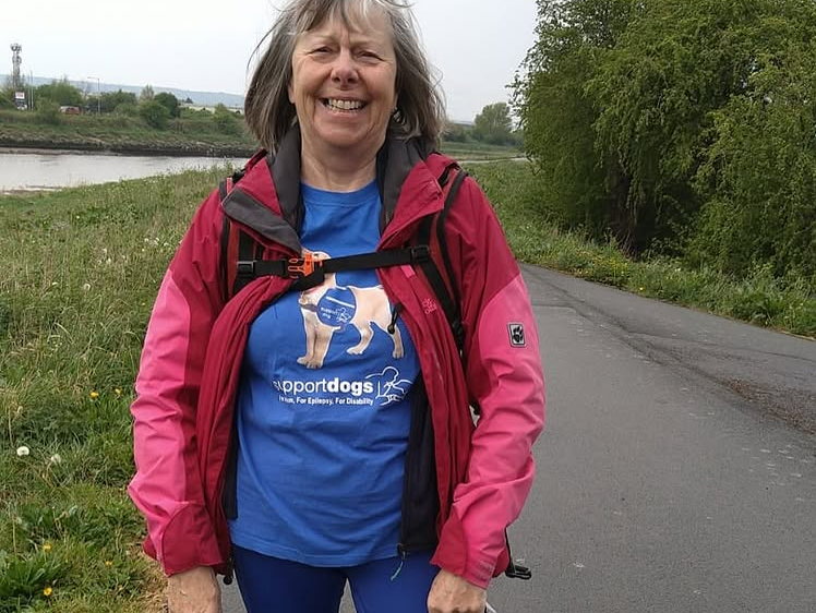 Janet Baldock wearing a Support Dogs t-shirt during her Wales Coast Path charity walk