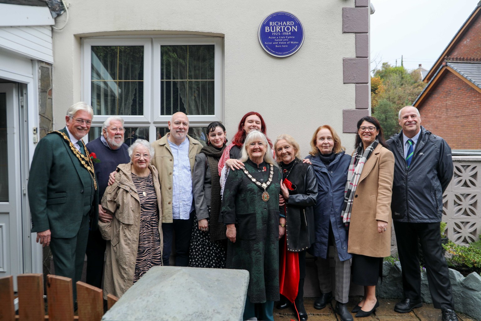 Unveiling of Richard Burton’s Blue Plaque in Pontrhydyfen, attended by family and community members.