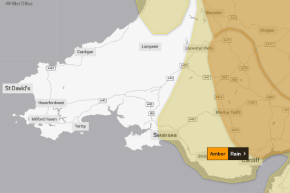 Met Office weather warning map highlighting yellow rain warnings in Swansea, Neath Port Talbot and Bridgend, and amber warnings in Newport and Monmouthshire.