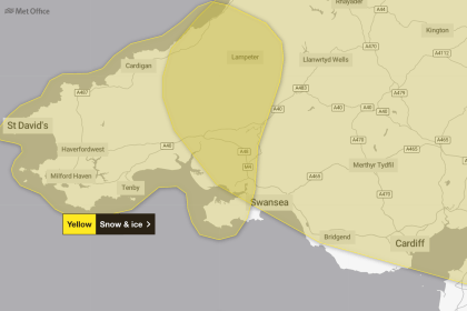 Met Office map showing Yellow Weather Warnings for snow and ice in South West Wales, including Carmarthenshire, Pembrokeshire and Swansea, with wider ice alerts across Wales.