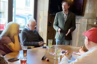 Richard Taylor of Advance UK addressing attendees at a meeting inside The Brunswick Arms, Swansea.
