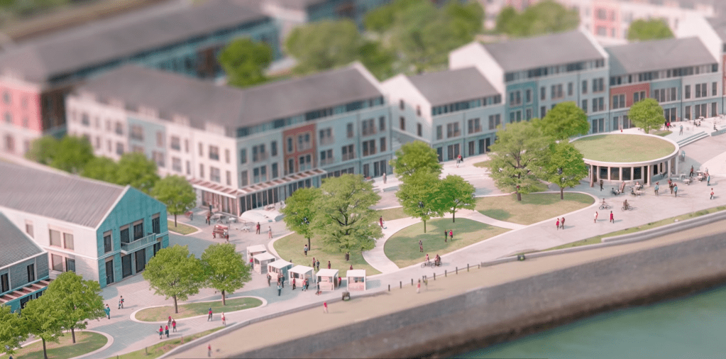 Urban park with trees, seating, and modern buildings in waterfront development.