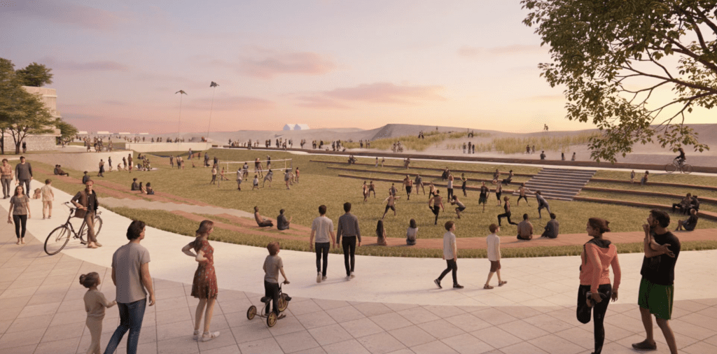 Public park with seating, grassy field, and people playing and relaxing.