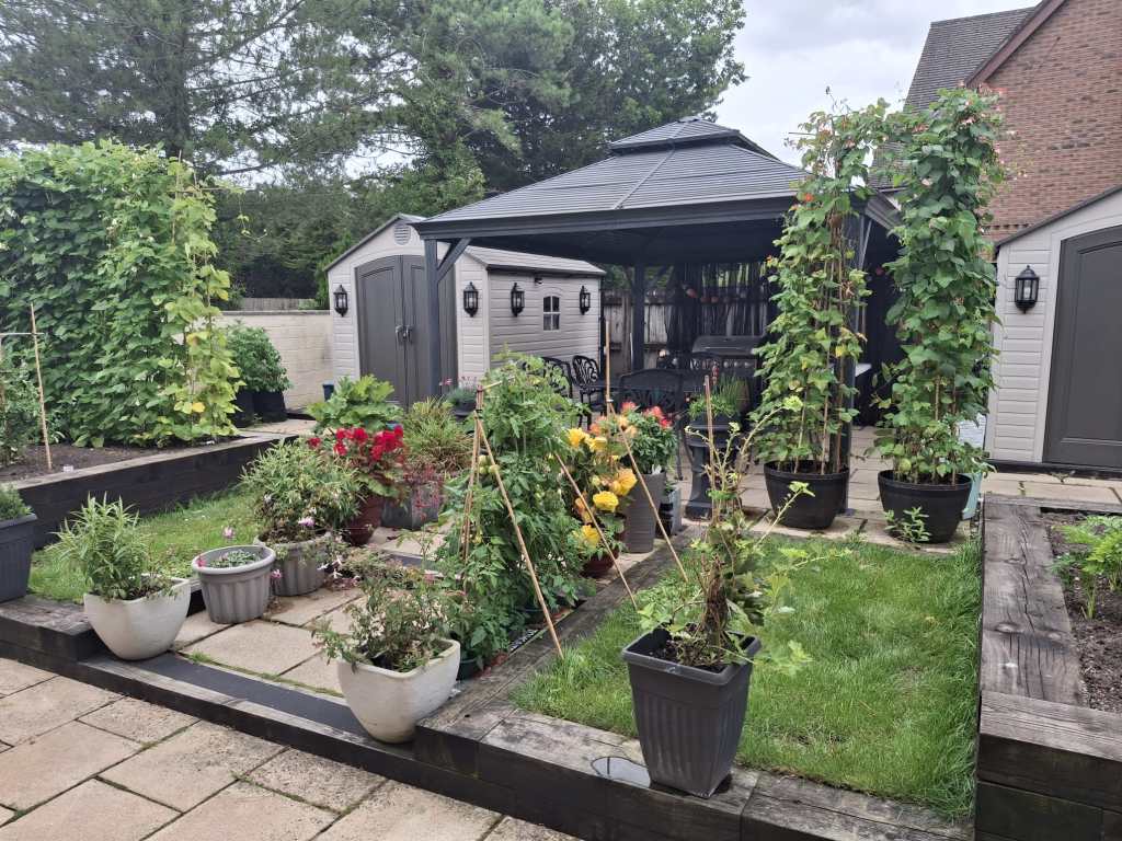 Raised beds and gazebo in Clive Jeffries’ well-maintained garden in Gorseinon