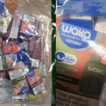 Close‑up image showing rows of bagged vapes seized by Trading Standards in Neath Port Talbot.