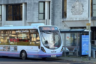 First Cymru 3A bus parked outside Swansea Guildhall on a city centre route.