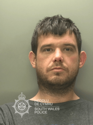 Police custody image of Jason Grove, a 34‑year‑old man from Clase, Swansea, sentenced to 30 months in prison for drug offences and possession of a knife.
