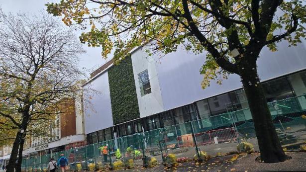 Exterior view of Y Storfa building under construction in Swansea city centre.