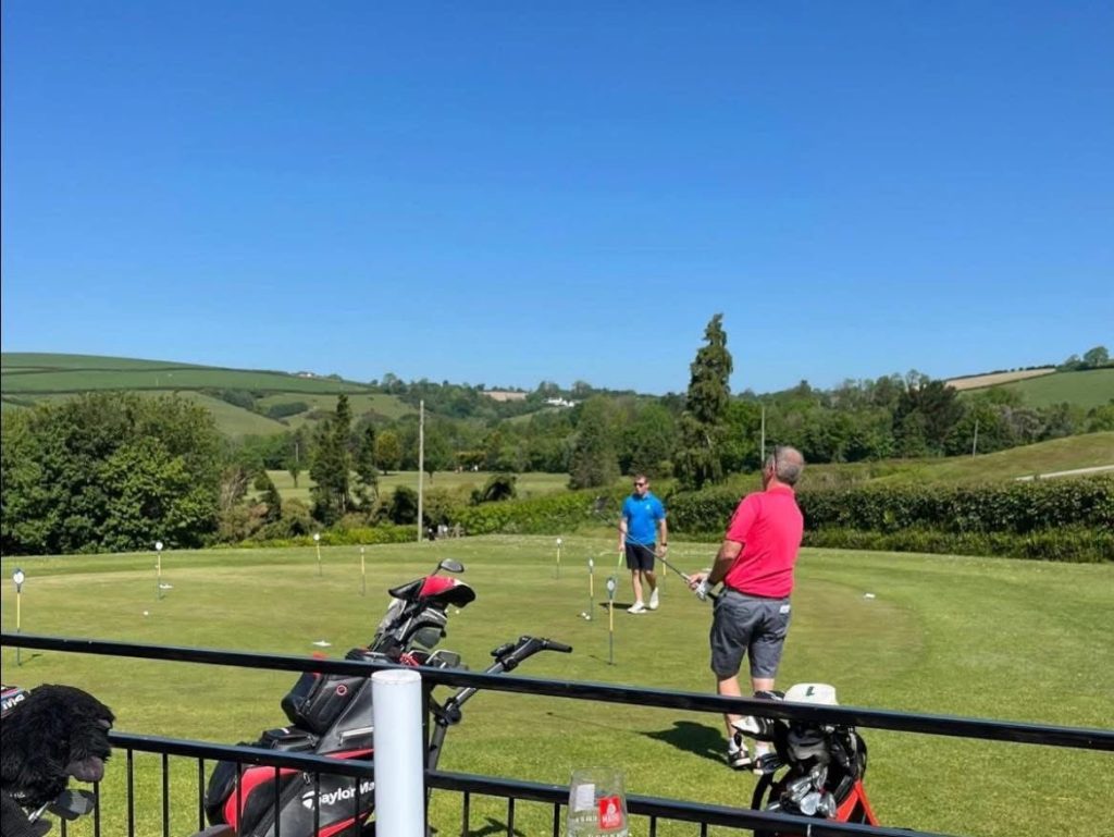 Golfers putting at Derllys Court Golf Club during MS Charity Golf Day