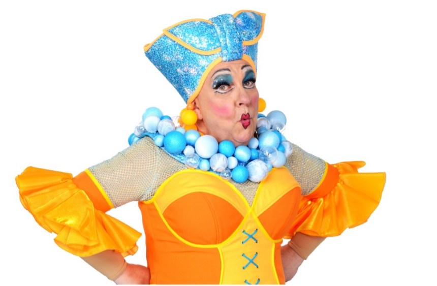 Kev Johns in full panto dame costume at Swansea Grand Theatre, celebrating nearly 30 years on stage.