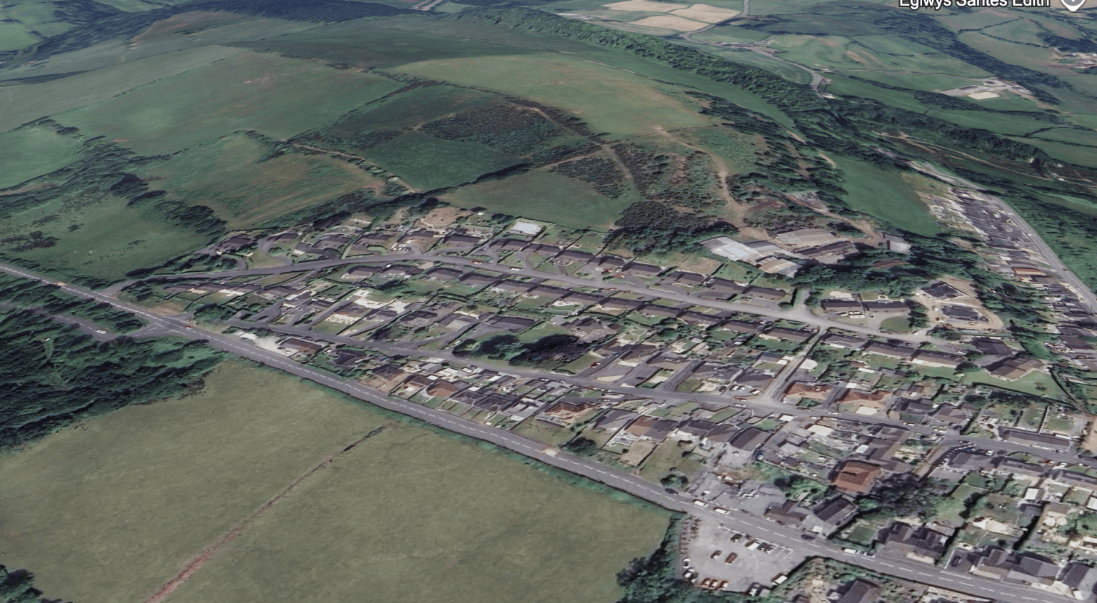 Satellite image of Fforest near Pontarddulais, showing houses, green fields, and land behind the village where a firearms incident was reported.