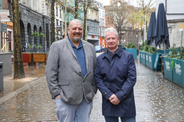 Andrew Douglas and Steve Gallagher stand together promoting Swansea BID’s new 24/7 crime reporting line.