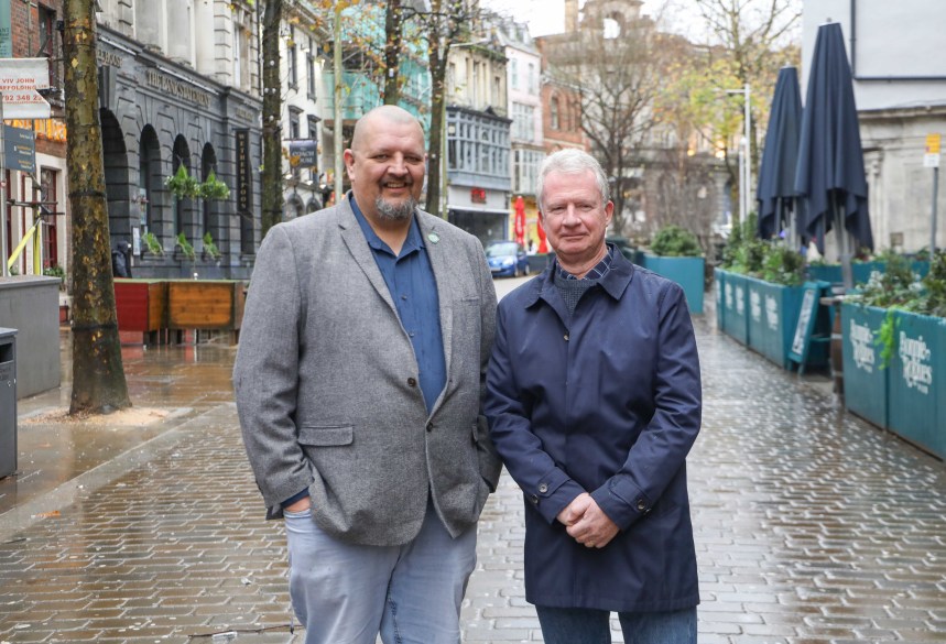 Andrew Douglas and Steve Gallagher stand together promoting Swansea BID’s new 24/7 crime reporting line.