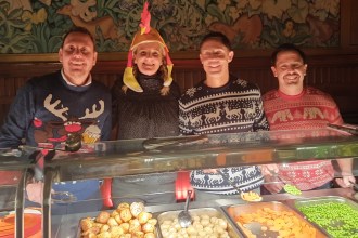 Rob Stewart, Jess Rice and Andrew Stevens in festive jumpers at Swansea’s Together at Christmas event in Brangwyn Hall.