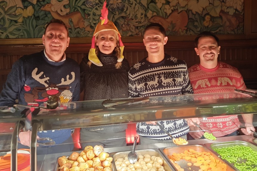 Rob Stewart, Jess Rice and Andrew Stevens in festive jumpers at Swansea’s Together at Christmas event in Brangwyn Hall.