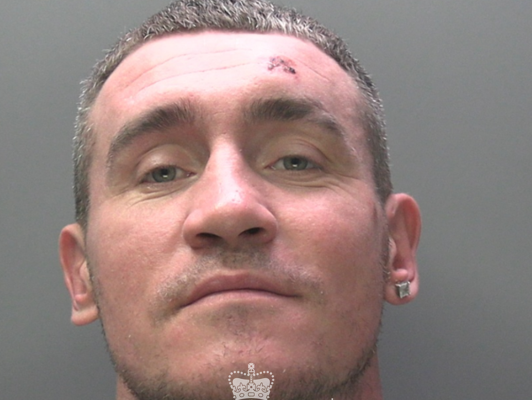 Mugshot of David Bradshaw, a Swansea man sentenced to prison for domestic violence and assaulting an emergency worker.