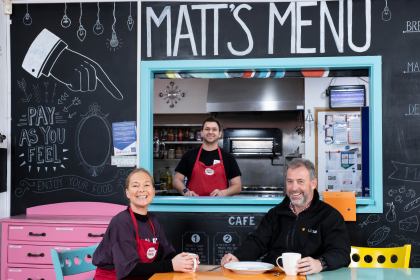 Becci Roberts and Tom Lynch of Matthew’s House with Alan Jenkins of UKSE inside Matt’s Café in Swansea.