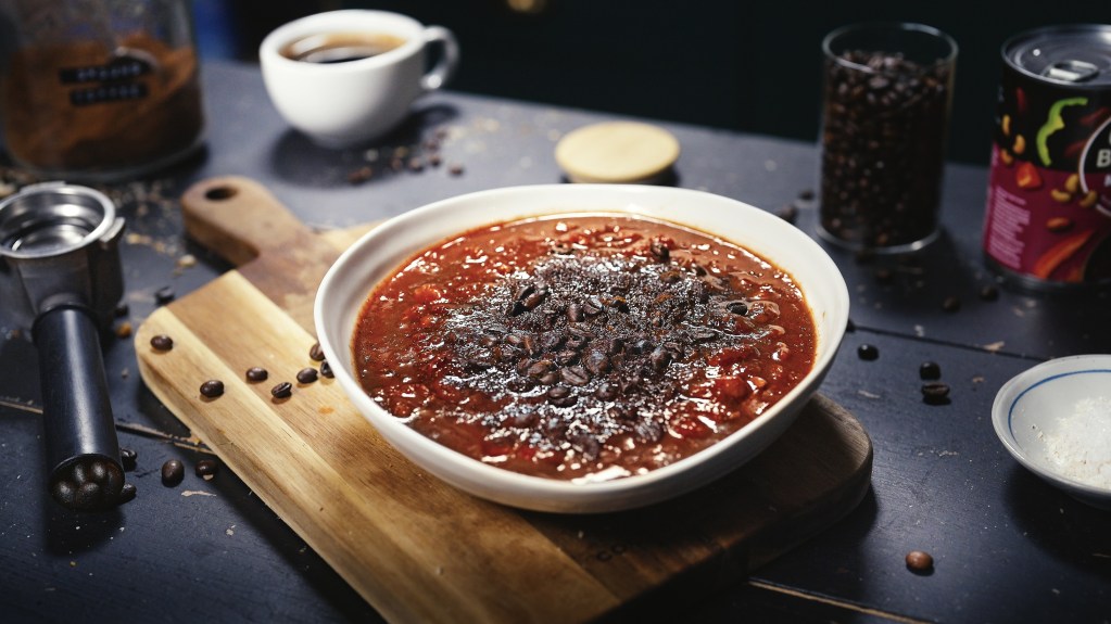 Mixed bean chilli soup with a dusting of coffee on top.