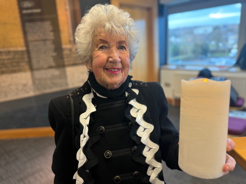 Norma Glass MBE speaking at the Holocaust Memorial Day event in Swansea.