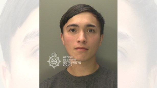 Head‑and‑shoulders police mugshot of Kai Giggie, a 26‑year‑old white man with a youthful appearance, photographed against a plain background.