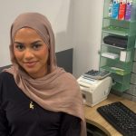 Khadija Ali, a weekend optical assistant at Specsavers Swansea, pictured in store. (Specsavers)